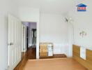 Bedroom with bed frame and doorway view