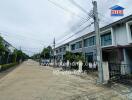 Street view of residential neighborhood with multiple row houses