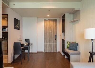 Living area with dining table and wooden floor