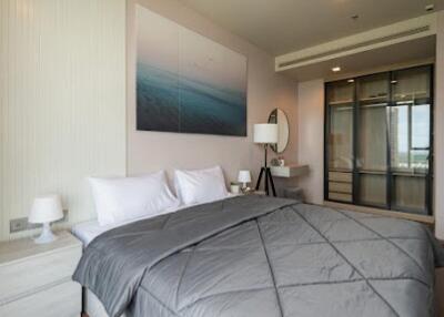 Modern bedroom with double bed and gray bedding