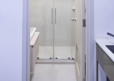 Modern bathroom with glass shower door