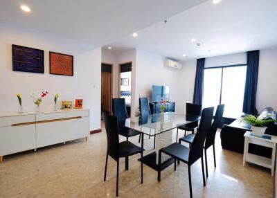 Spacious living and dining area with modern furniture