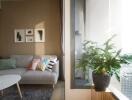 Modern living room with a couch, coffee table, and large window with city view