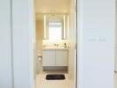 Bathroom with modern fixtures and lighting