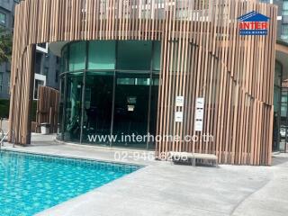 Modern building facade with a pool