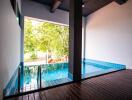 Indoor pool area with blue tiles