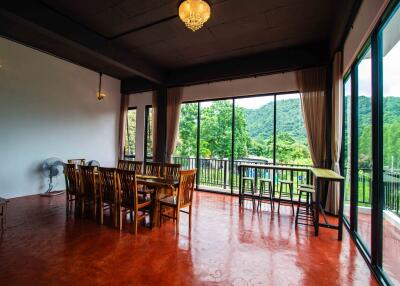 Spacious dining area with large windows and scenic views