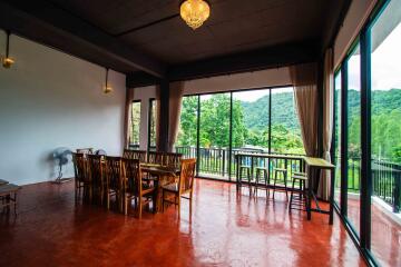 Spacious dining area with large windows and scenic views