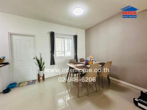 Bright and modern dining room with table and chairs