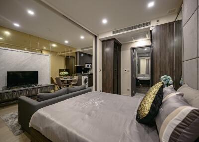 Modern bedroom with integrated living and dining area