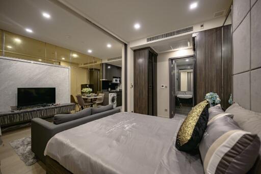 Modern bedroom with integrated living and dining area