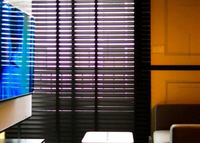 Cozy living room with vertical blinds