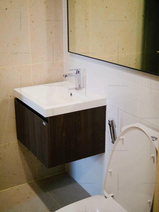 Modern bathroom with floating vanity and toilet