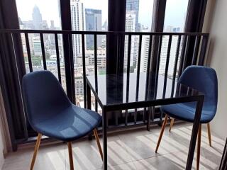 Small dining area with a city view