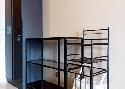 modern entryway with shelving and storage basket