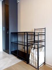 modern entryway with shelving and storage basket