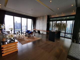 Spacious modern living room with large windows and city view