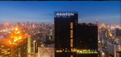 Panoramic view of city skyline with tall buildings at dusk