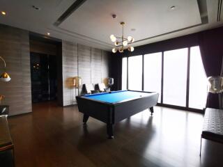 Modern recreational room with pool table