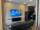 Modern living area with TV and kitchenette