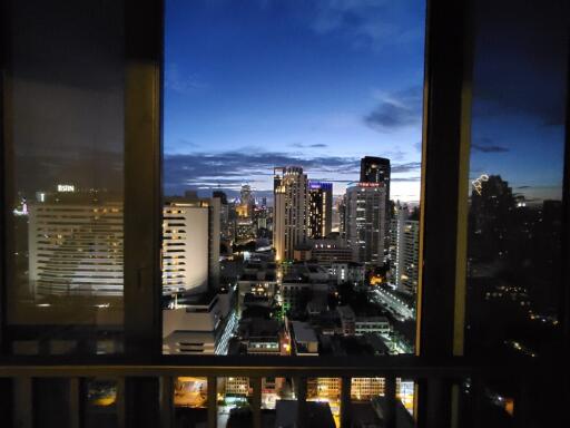 Nighttime cityscape view from a high-rise building