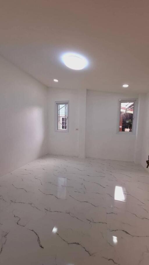 Bright living room with marble floor