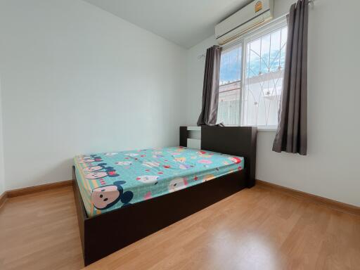 Modern bedroom with bed and window