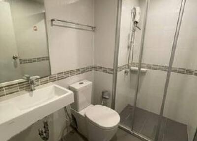 modern bathroom with glass shower door and sanitary fixtures