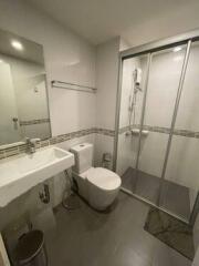 modern bathroom with glass shower door and sanitary fixtures