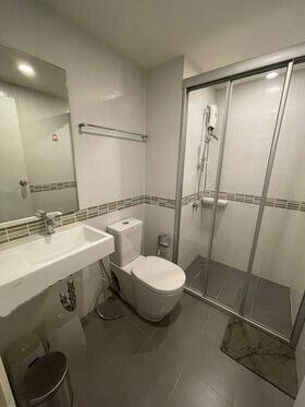 modern bathroom with glass shower door and sanitary fixtures