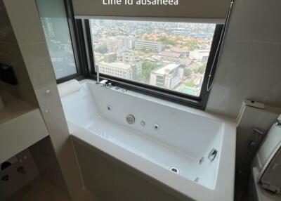 Modern bathroom with city view