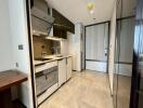 Modern kitchen with sleek cabinetry and built-in appliances