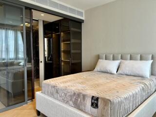 Modern bedroom with glass door wardrobe