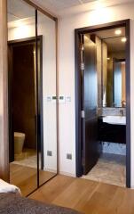 Modern bathroom view with a mirror and toilet