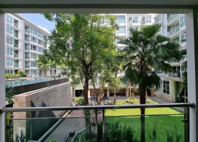 View from balcony overlooking a courtyard in a residential complex