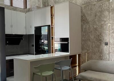 Modern kitchen with island and seating