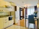 Modern kitchen and living area with natural light