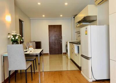 Modern kitchen and dining area with appliances