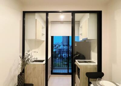 Modern kitchen with adjacent dining area