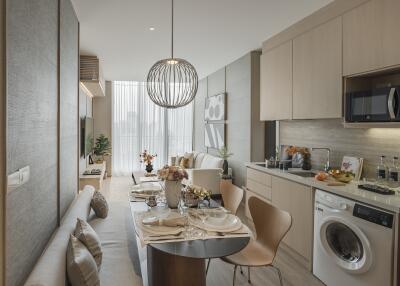 Modern open-plan kitchen and living area with dining table