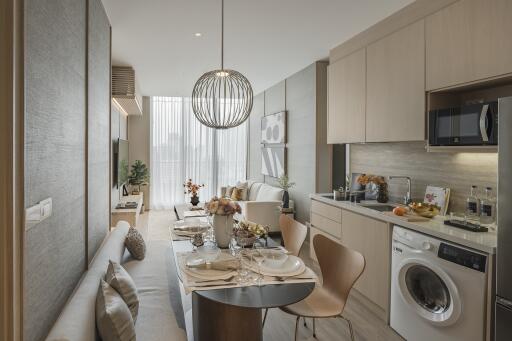 Modern open-plan kitchen and living area with dining table