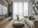 Modern living room with large sofa, coffee table, and floor-to-ceiling windows