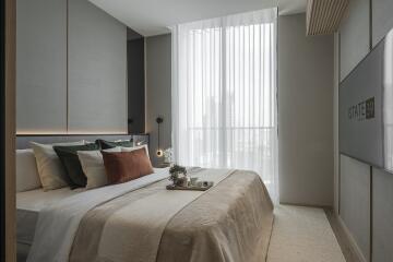 Modern bedroom with large window and natural light