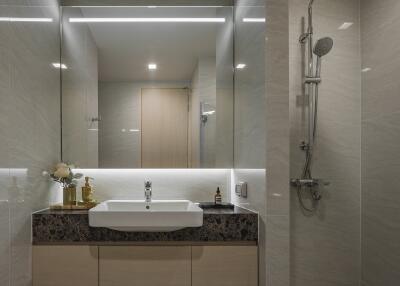 Modern bathroom with large mirror and shower