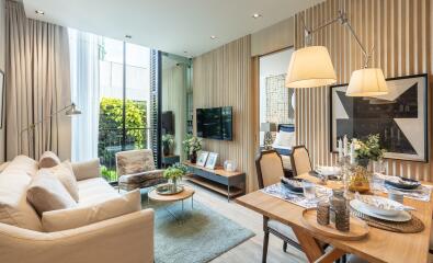 Modern living and dining area with natural light