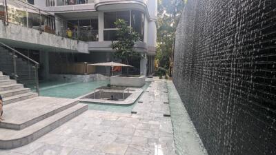 Modern outdoor area with a water feature