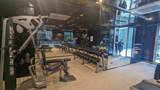 Indoor gym with various exercise equipment