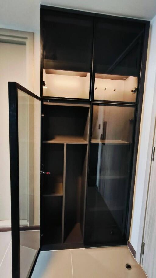 Modern storage shelves with glass doors