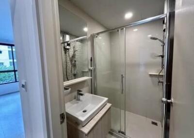 Modern bathroom with glass shower enclosure