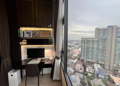 Modern study area with large window and city view